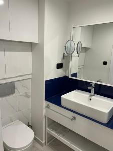 Ванна кімната в The best beach aparthotel Orbi city Batumi
