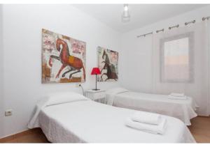 Postel nebo postele na pokoji v ubytování Anahi Homes Corralejo - Villa Brezo 3