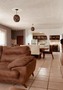 a living room with a couch and a table at Casa Ragma in Parras de la Fuente
