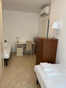 Posteľ alebo postele v izbe v ubytovaní Lago e Giardino apartment