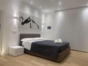 Postel nebo postele na pokoji v ubytování ABBA ROOMS