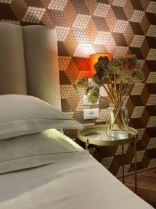 Postel nebo postele na pokoji v ubytování Light Hotel