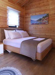 Postel nebo postele na pokoji v ubytování Bujtina SIAR + 37 fotografií