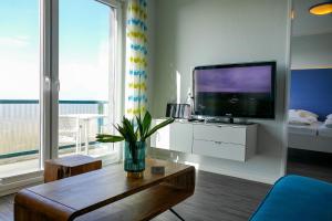 TV/trung tâm giải trí tại Beach Lodge BL08