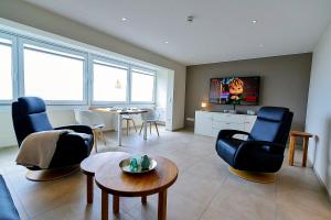 Et tv og/eller underholdning på Strandhochhaus SF07