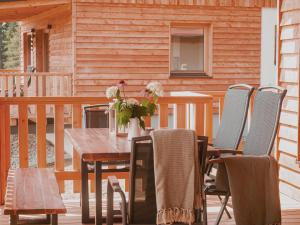 Balkón nebo terasa v ubytování Hochleben-Chalets am Erlebnisbauernhof Steinerhof