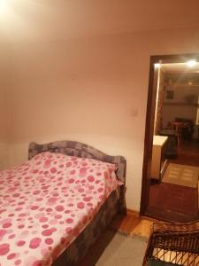 Кровать или кровати в номере Apartman Nebojša