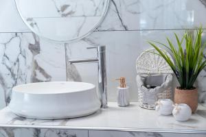 A bathroom at OLYMPUS Paradise 6