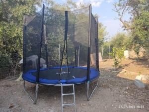 a trampoline with a net on top of it at CORFU OASIS studio in Neochorákion