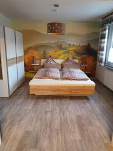 Llit o llits en una habitació de Fewo TaLuLa - Sauerland mit Hund