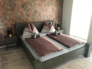 Postel nebo postele na pokoji v ubytování A-765 Apartman