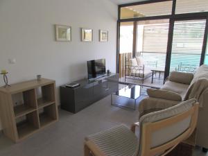 אזור ישיבה ב-GOLF RESORT APARTMENT