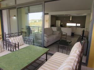 A seating area at GOLF RESORT APARTMENT