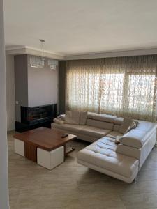 Χώρος καθιστικού στο Pearl House Skg
