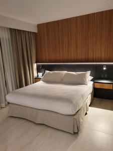 Postel nebo postele na pokoji v ubytování Lastarria Hotel + 37 fotografií