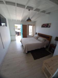 Postel nebo postele na pokoji v ubytování Hotel Trocadero