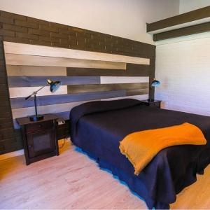 Postel nebo postele na pokoji v ubytování Hotel Trocadero