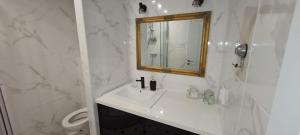 Kúpeľňa v ubytovaní Apartment J&M