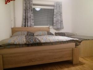 Posteľ alebo postele v izbe v ubytovaní Apartmán Na Skále