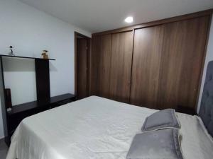 Cama o camas de una habitación en Hermoso apartamento en Valle del Lili (Marfil B)