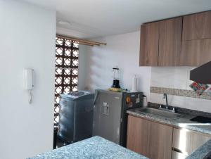 Una cocina o zona de cocina en Hermoso apartamento en Valle del Lili (Marfil B)