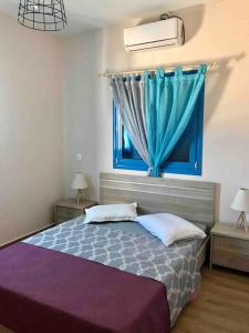 Posteľ alebo postele v izbe v ubytovaní Beautiful 2-Bed Apartment in grande grotta