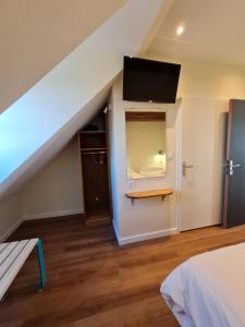 Posteľ alebo postele v izbe v ubytovaní Le Faubourg - Gîte et chambres d'hôte