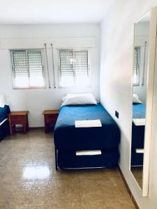 A bed or beds in a room at Apartamento Flamingo Puerto Marina - 150m Playa
