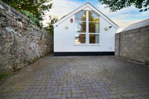 Fotografie z fotogalerie ubytování The Village Coach House v destinaci Cardiff