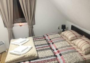 Postel nebo postele na pokoji v ubytování Sobe Baranin Zabljak
