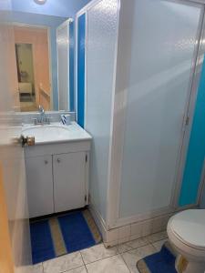 A bathroom at Finest Accommodation Renfrew Place 4-12 Renfrew Rd 2 bedroom 2 bat Apt # 15 New Kinston Jamaica