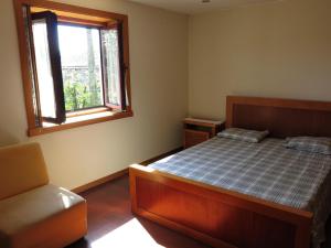 Postel nebo postele na pokoji v ubytování Impeccable 2-Bed House in Prozelo