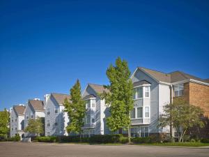 a row of houses in a residential neighborhood at Sonesta ES Suites Cincinnati - Sharonville East in Sharonville