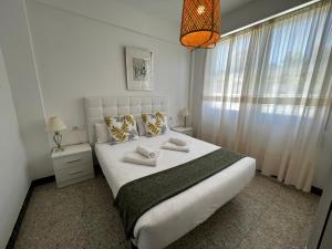 Ένα ή περισσότερα κρεβάτια σε δωμάτιο στο Oktheway Perbes Vintage 2