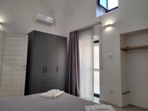 Postel nebo postele na pokoji v ubytování Le dimore del salento appartamento 1