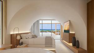 Кровать или кровати в номере Impression Isla Mujeres by Secrets - Adults Only - All Inclusive