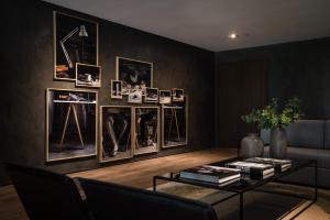 a living room with a couch and a table at SLS Buenos Aires Puerto Madero in Buenos Aires