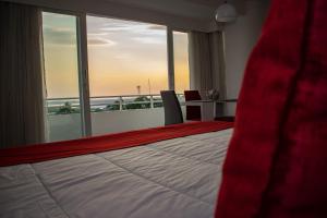 Postel nebo postele na pokoji v ubytování Hotel Súper Estrellas