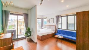 Postel nebo postele na pokoji v ubytování VNAHOMES Serviced Apartment