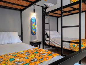 Postel nebo postele na pokoji v ubytování Maresia Hostel Paraty BR