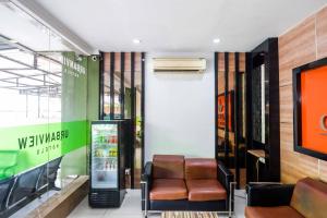 Ο χώρος του λόμπι ή της ρεσεψιόν στο Urbanview Hotel Capital Makassar
