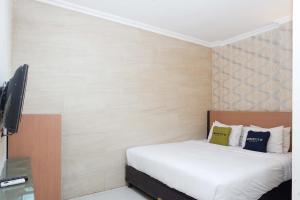 Gallery image of Urbanview Hotel Capital Makassar in Pampang