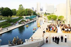 a group of people standing next to a river at Private Studio- Queen Bed- 10 min to DT Indy in Indianapolis
