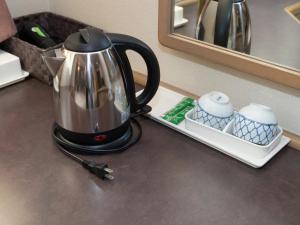 Příslušenství pro přípravu čaje a kávy v ubytování Nagasaki Orion Hotel