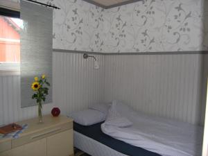 A bed or beds in a room at B & B Flattinge Fritidshus