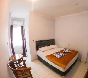 Katil atau katil-katil dalam bilik di Hotel Mehara