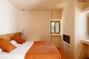 Un ou plusieurs lits dans un hébergement de l'établissement Casbah Formentera Hotel & Restaurant