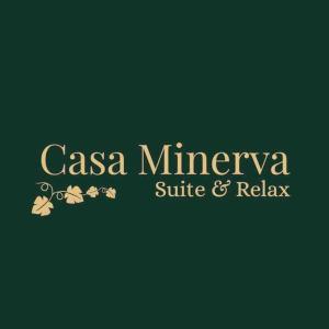 a sign for a restaurant with the words casa minerva at Casa Minerva - Suite e Relax in Gioia del Colle