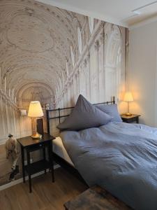 a bedroom with a bed and a coffered ceiling at Schloss Kalteneck in Schwenningen