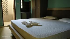 Voodi või voodid majutusasutuse Ashirbad Guest House toas